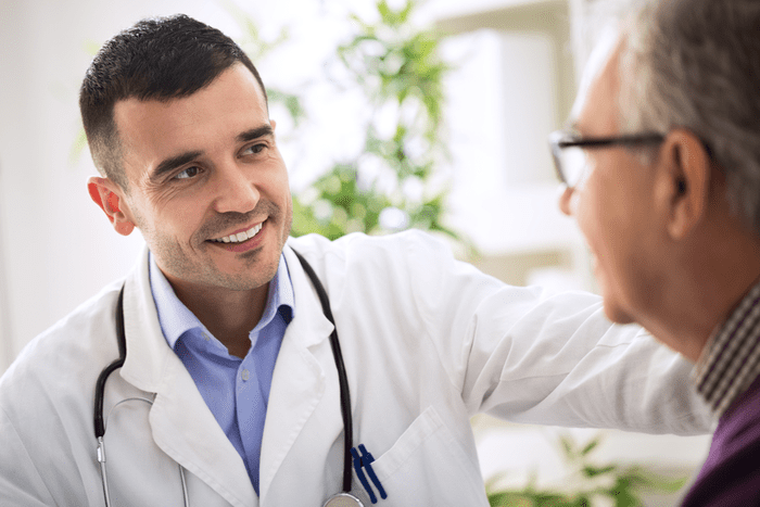 Physician with patient